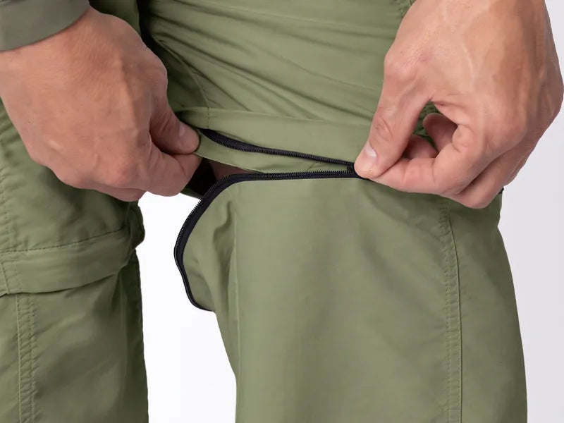 Detalhe real do zíper que destaca a perna da Calça Bermuda Explorer.